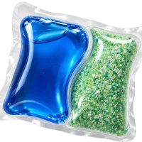 Laundry detergent pod with separate liquid and granular compartments